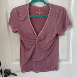 Red V-neck shirt